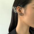 Detail of silver dragon ear cuff featuring intricate wings and gothic aesthetic - Right Ear Silver Dragon Style (2347)