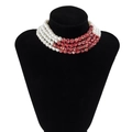 Detail of 5-layer choker necklace featuring white pearls and red marble texture beads - Style 2 Necklace (5381)