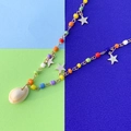 Collana boho con perline arcobaleno, stelle dorate e un ciondolo in conchiglia naturale - Multicolore (2477) BABY GIRL Conchiglia