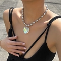 Detail of silver bead chain and iridescent heart pendant on neck for Y2K fashion style - Silver Ball Chain Iridescent Heart Pendant / AB Aurora (C5667)