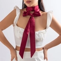 Elegant wine red satin choker tied in a large bow with long tassels on a model - Necklace Style (0756) / Burgundy