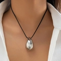 Minimalist silver teardrop pendant necklace with black cord worn by a model - Cord Teardrop Necklace (6099) / Silver