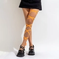 Detail of bright orange elastic leg chain with criss-cross wrap design on model - Single Orange Leg Chain (0206)