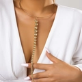Fashion punk gold metal choker with large bead tassel pendant on a V-neck model - Gold