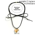 Detailed view of adjustable black cord choker with large 3cm polished gold heart pendant - Style Two (5856) / Gold