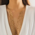 Gold punk choker necklace featuring long tassel chains and delicate star pendants - Gold Star Tassel Style (5821)