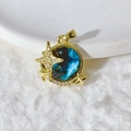 Close-up of gold-plated celestial pendant with blue starry disk and micro-set zircon stars - 星球星空(1)