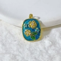 Oval gold-plated flower pendant with blue glitter, zircon stones and green enamel leaves - Blue Enamel Double Flower Style (12)