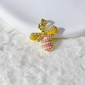 Gold bee pendant with yellow wings and pink crystal body on a white plush surface - Yellow Wings Pink Body Gold Frame Style