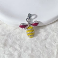 Silver bee pendant with red enamel wings and yellow zircons on white plush background - Red Wings Yellow Black Striped Body Style