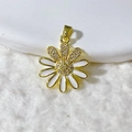 Macro shot of gold-plated daisy pendant with white enamel petals and sparkling zircons - White Daisy (4)