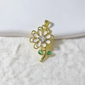 Detail of flower pendant with white enamel petals, gold finish and zircon center - White Flower Gold Plated Style