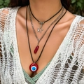 Three-layer evil eye beaded necklace with red crystal and star charm on a model - Star Red Stone Red Evil Eye Style (3818)