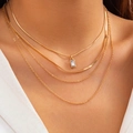 Minimalist four-layer gold layered necklace with rectangular pendant and snake chains - Gold (Zirconia Style)