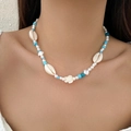 Bohemian beaded necklace with white sea turtle pendant, shells and blue beads - Mixed Ocean Elements