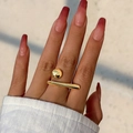 Macro shot of minimalist gold plated geometric ring featuring ball and bar design - Ball and Bar Geometric Style / Light Gold (0734)
