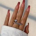 Close-up of minimalist silver metal ring with polished ball and bar on model's hand - Silver Ball and Bar Style / Silver (0734)