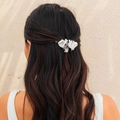 Silver alloy hair clip with irregular metal pleats worn on long dark brown hair - Silver Fluid Pleated Hair Clip (0553)