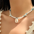 Beaded summer necklace featuring sky blue beads with starfish and shell pendant - Blue White Starfish Style (6396)