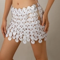 Detail of white circular sequins linked by metal rings on a cutout body chain skirt - White Sequin Skirt (1646)
