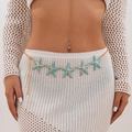 Detail of starfish body chain with blue enamel charms on gold chain over crochet skirt - Blue Starfish Style (1664) / Gold + Blue