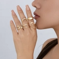 Minimalist 4-piece irregular molten gold ring set with hollow and curved designs - Light gold