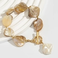 Detailed macro view of baroque pearl bracelet with gold beads and elegant OT clasp design - White Bracelet(2487)
