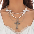Detail of layered cross necklace with pearl beads, silver star and silk bow tie - White Bowknot Pearl Style / Silver White (6504k2)