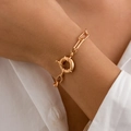 Minimalist thick chain bracelet in gold finish with a large spring ring clasp worn on wrist - Gold (2465)