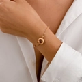 Elegant 18K rose gold geometric bracelet with a stylish mariner clasp on a female wrist - Gold (2466)