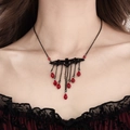 Macro detail of Gothic black bat pendant with red crystal droplets and tassel chains - Black Bat Red Water Drop Necklace (6625K2)