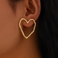 Golden heart drop earrings featuring unique crumpled texture on model ear - 01 Hammered Hollow Heart (Gold) (3327)