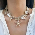 Detailed view of ocean style shell necklace with golden starfish and seahorse charms - White Necklace(6675)