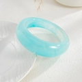 Translucent light blue resin bangle with irregular cloud textures and wide round shape - Blue (2886)