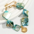 Teal beaded shell pendant bracelet with gold starfish and lobster clasp accents - Blue Bracelet(2488)