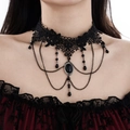 Detail of gothic black lace choker with dark gemstone pendant and tassel chains - Black Gemstone Chain Style (6576)