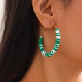Close-up of bohemian gold hoop earrings with green and white Heishi clay beads - Green And White Bohemian Style (3423-K5)