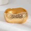 Detail of gold hammer-textured wide bangle with irregular edges and hinge closure - Gold (2544)