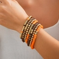 Bohemian multilayer beaded bracelet set with maple leaf charms and orange heishi beads - Bohemian Multicolor Collection