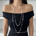 Double-layered long pearl necklace with silver chain and mixed-size beads on a model - Double Layer Pearl Hollow Flower Style (5477) / Silver Style 5477