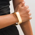 Polished gold wide geometric cuff bracelet with mirror finish on model wrist - Mirror Finish Style (2635k1) / Gold