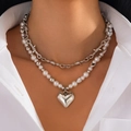 Double-layer necklace with silver heart pendant and white pearl beads for women - Silver