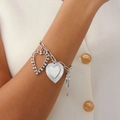 Silver paperclip bracelet featuring three heart charms with textured and openwork designs - Silver Bracelet (2925)