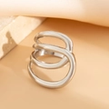 Macro shot of silver multilayer geometric wide band ring on textured stone surface - Silver Multi-layer Irregular Ring (0822)