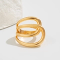Detail view of triple-layered irregular gold oval ring with high-polish metallic finish - 04 Light Gold Ring (0822) / Gold