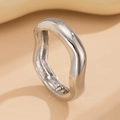 Detailed close-up of a silver chunky wave bangle with a hidden spring hinge mechanism - Wave Shape Design (2698) / Silver