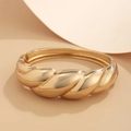 Polished golden hollow twisted croissant bangle bracelet with spring hinge closure - 03 Gold Twisted Spring Bangle (2429)