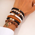 Detail of stacked clay bead bracelets with Game Day lettering and football charm - 07 Multicolor Set (5819)