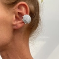 Detailed view of silver shell-shaped ear cuff on cartilage without piercing - Shell (3551) / 1PC / Gold
