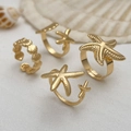 Gold ocean theme adjustable ring set with starfish and seashell charms on shells - Ring Set / Light gold